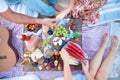 Picnic on the beach at sunset in the style boho, food and drink conception Royalty Free Stock Photo