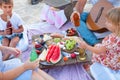 Picnic on the beach at sunset in the style boho, food and drink conception Royalty Free Stock Photo