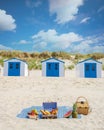 Picnic on the beach Texel Netherlands, couple having picnic on the beach of Texel