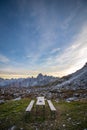 Picnic bench in stunning alpine scenery at sunset. The mountain