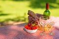 Picnic. bottle of wine with glasses. strawberry.romance.banner