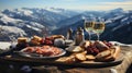 Picnic breakfast in the Alps with cheese, ham, bread and white wine