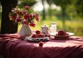a picnic with fruits and flowers on red cloth table, AI Generated Royalty Free Stock Photo