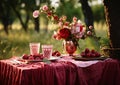 a picnic with fruits and flowers on red cloth table, AI Generated Royalty Free Stock Photo