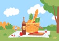 Picnic in garden. Wicker basket with food on blanket and bottle of wine. Patio or backyard summer party. Flat outdoor