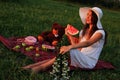 Picnic on a green meadow in the summer