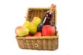 Picnic hamper with fruits and wine Royalty Free Stock Photo