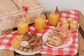 Picnic lunch. Baked ribs, sandwich and mango juice