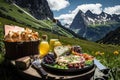 picnic lunch in lush alpine meadow with view of towering mountain peaks