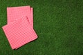 Picnic napkins on grass, top view Royalty Free Stock Photo