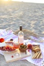 Picnic outdoor with rose wine fruits meat and cheese Royalty Free Stock Photo