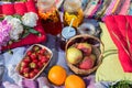 Picnic in the outdoor with strawberry, apples, oranges and cold Royalty Free Stock Photo