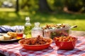 picnic setting with a bowl of bourbon bbq pulled chicken