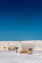 Picnic Shelters At The Edge of White Sands Royalty Free Stock Photo