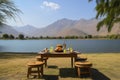 picnic with stunning view of a mountain range or serene lake, for the ultimate outdoor dining experience