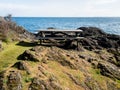 Picnic table along the hiking trail in Lime Kiln Point State Park on San Juan Island Royalty Free Stock Photo