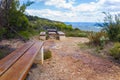 Picnic table and chairs on hiking trail in the mountain Royalty Free Stock Photo