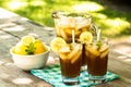 Picnic Table With Cold Iced Tea And Lemons Royalty Free Stock Photo