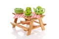 Picnic table with green dotted tablewear Royalty Free Stock Photo