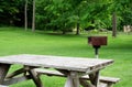 Picnic Table and Grill in Park Royalty Free Stock Photo