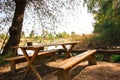 Picnic table outside in nature Royalty Free Stock Photo