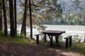 Picnic Table by the River Royalty Free Stock Photo