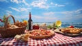 Picnic Table Set Up At The Beach With Wine, Fresh Fish, Pizza, Bread And Salad