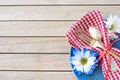 Picnic Table Setting in Red White and Blue Colors for July 4th Celebration on Wood Board Background Table with room or space for c Royalty Free Stock Photo