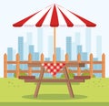 Picnic table with umbrella outdoor scene Royalty Free Stock Photo