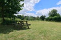 Picnic table under a tree in the Kent countryside Royalty Free Stock Photo