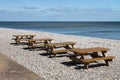 Picnic Tables on the Beach Royalty Free Stock Photo