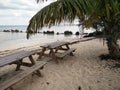 Picnic tables on a beach Royalty Free Stock Photo