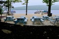 Picnic Tables on Mountain Lake Beach Royalty Free Stock Photo