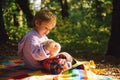 Picnic with teddy bear. Hiking with favorite toy. Better together. Happy childhood. Inseparable with toy. Boy cute child Royalty Free Stock Photo