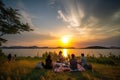 picnic with view of the sunset, people enjoying a moment of tranquility and beauty