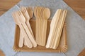 Picnic wooden cutlery and paper plates. Natural materials. Plastic free