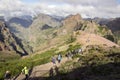 Pico Ariero / MADEIRA island, PORTUGAL - April 21, 2017: Groups of tourists hiking on touristic trail from peak Pico Ariero to P