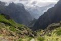 Pico do Arieiro hiking trail, amazing magic landscape with incredible views, rocks and mist, view of the valley between rocks