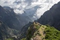 Pico do Arieiro hiking trail, amazing magic landscape with incredible views, rocks and mist, view of the valley between rocks