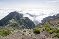 Pico Ruivo hiking, above clouds, amazing magic landscape, incredible views, sunny weather with low clouds, island Madeira, Portu