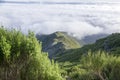 Pico Ruivo hiking, above clouds, amazing magic landscape, incredible views, sunny weather with low clouds, island Madeira, Portu