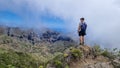 Pico Verde - Man with backpack enjoying view on Teno mountain range near Masca village, Tenerife, Canary Islands, Spain, Royalty Free Stock Photo