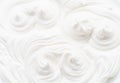 Pics and waves in yoghurt or cream surface. Top view Royalty Free Stock Photo