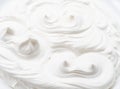 Pics and waves in yoghurt or cream surface. Top view Royalty Free Stock Photo