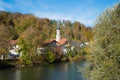 Pictorial autumn landscape Wolfratshausen, Loisach river and St. Andreas church