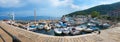 Pictorial harbor with fishing boats and seaside promenade, health resort croatia