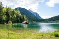 Pictorial lake Lautersee at springtime, boathouse and view to Wetterstein mountain