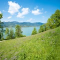 Pictorial spring landscape Leeberg hill, view to turquoise lake Tegernsee, bavarian tourist resort. square format Royalty Free Stock Photo