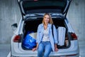 Adult woman tourist in underground airport parking lot