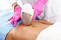 Adult woman having laser hair removal in professional beauty salon